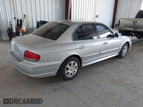 2002 Hyundai Sonata GLS with VIN KMHWF35H32A643718, listed as a IAAI auction lot 41668672 with 174,782 mi miles. Bid and sale history available at carsss.com. Image 4.