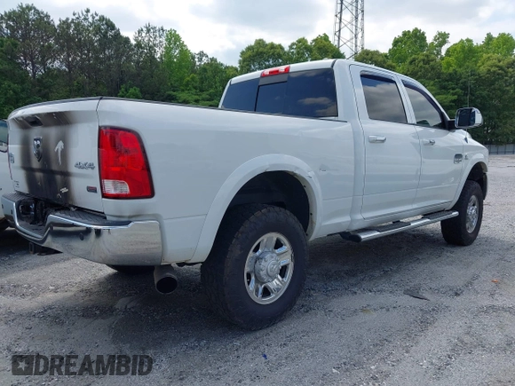 2012 Ram 2500 Laramie Longhorn with VIN 3C6UD5GL1CG121386, listed as a IAAI auction lot 42119700 with 207,173 mi miles and . Bid and sale history available at DreamBid. Image 4.