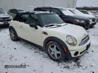 2010 MINI Convertible with VIN WMWMR3C50ATU97287, listed as a Copart auction lot 89116615 with 120,323 mi miles and Salvage Title. Bid and sale history available at DreamBid. Image 4.