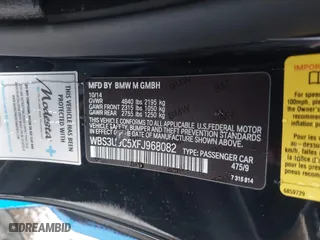 2015 BMW M4 with VIN WBS3U9C5XFJ968082, listed as a IAAI auction lot 41513593 with 57,715 mi miles. Bid and sale history available at carsss.com. Image 9.