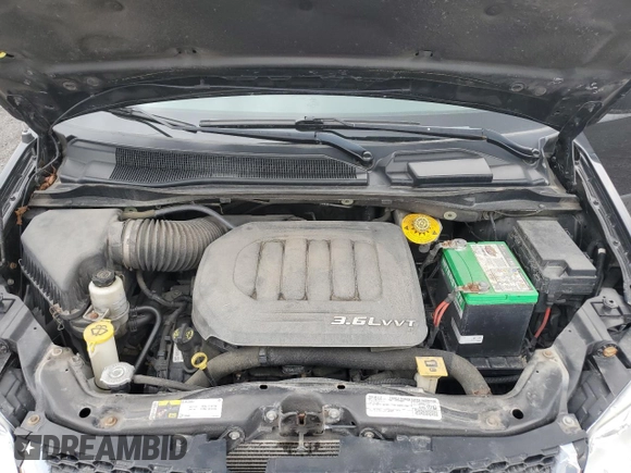2015 Dodge Grand Caravan SE with VIN 2C4RDGBGXFR744203, listed as a Copart auction lot 54791795 with 216,594 mi miles and Clean Title. Bid and sale history available at DreamBid. Image 12.