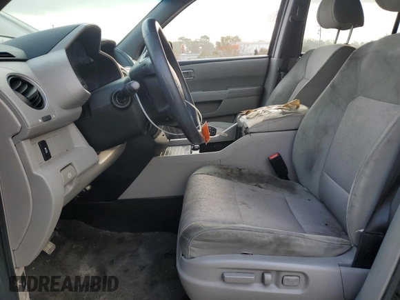 2012 Honda Pilot EX with VIN 5FNYF4H46CB079325, listed as a Copart auction lot 43369735 with 220,522 mi miles and Salvage Title. Bid and sale history available at DreamBid. Image 7.