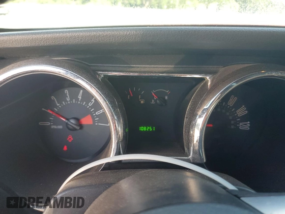 2007 Ford Mustang Deluxe z VIN 1ZVFT84N975296099, wystawiony jako Copart lot #58169845 z przebiegiem 108 251 mil mil oraz Szkoda całkowita • Salvage title. Historia ofert i sprzedaży dostępna na DreamBid. Obrazek 9.