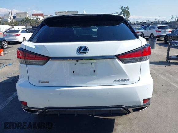 2021 Lexus RX with VIN 2T2SZMDA8MC289158, listed as a IAAI auction lot 41403874 with 84,981 mi miles. Bid and sale history available at carsss.com. Image 16.