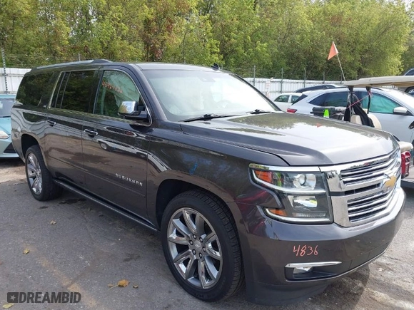 2015 Chevrolet Suburban LTZ with VIN 1GNSKKKC6FR243250, listed as a IAAI auction lot 40464836 with 120,030 mi miles. Bid and sale history available at carsss.com. Image 1.