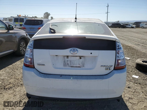 2007 Toyota Prius z VIN JTDKB20U477605335, wystawiony jako Copart lot #58747595 z przebiegiem 129 979 mil mil oraz Szkoda całkowita • Salvage title. Historia ofert i sprzedaży dostępna na DreamBid. Obrazek 6.