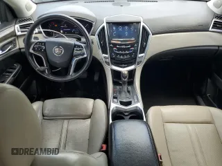 2014 Cadillac SRX Premium Collection z VIN 3GYFNGE30ES627895, wystawiony jako Copart lot #58605985 z przebiegiem 49 300 mil mil oraz Szkoda całkowita • Salvage title. Historia ofert i sprzedaży dostępna na DreamBid. Obrazek 8.