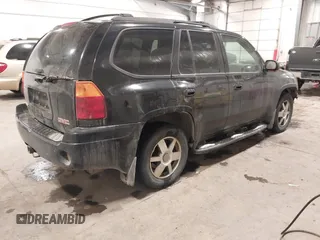 2005 GMC Envoy SLT with VIN 1GKDT13S452349125, listed as a IAAI auction lot 41148381 with 224,049 mi miles. Bid and sale history available at carsss.com. Image 4.