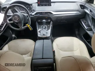 2020 Mazda CX-9 Touring z VIN JM3TCACY3L0411822, wystawiony jako Copart lot #60323295 z przebiegiem 61 348 mil mil oraz Szkoda całkowita • Salvage title. Historia ofert i sprzedaży dostępna na DreamBid. Obrazek 8.