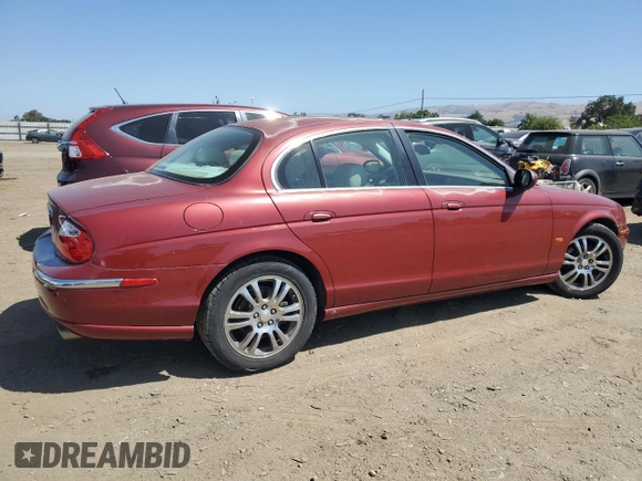 2003 Jaguar S-Type z VIN SAJEA01U13HM90556, wystawiony jako Copart lot #59578535 z przebiegiem 50 723 mil mil oraz Czysty tytuł • Clean title. Historia ofert i sprzedaży dostępna na DreamBid. Obrazek 3.
