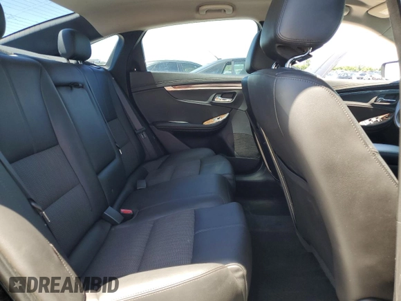 2015 Chevrolet Impala LT z VIN 2G1115SLXF9170508, wystawiony jako Copart lot #57777905 z przebiegiem 158 981 mil mil oraz Czysty tytuł • Clean title. Historia ofert i sprzedaży dostępna na DreamBid. Obrazek 10.