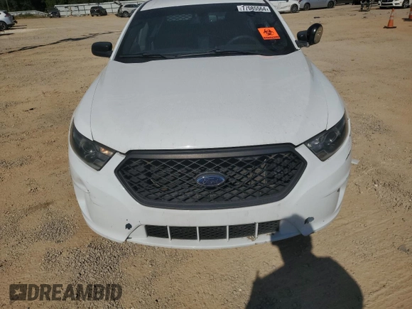 2015 Ford Police Interceptor with VIN 1FAHP2L80FG167962, listed as a Copart auction lot 77085564 with 121,447 mi miles and Salvage title. Bid and sale history available at DreamBid. Image 5.