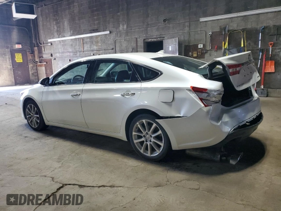 2015 Toyota Avalon Limited with VIN 4T1BK1EB6FU186515, listed as a Copart auction lot 54027865 with 104,000 mi miles and Salvage Title. Bid and sale history available at DreamBid. Image 2.