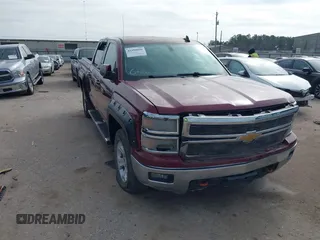 2015 Chevrolet Silverado 1500 LT with VIN 3GCUKREC0FG261927, listed as a IAAI auction lot 41598096 with Not Provided miles and . Bid and sale history available at DreamBid. Image 1.