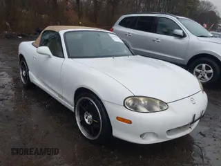 2002 Mazda MX-5 Miata Cloth z VIN JM1NB353420221527, wystawiony jako IAAI lot #41909623 z przebiegiem 90 260 mil mil oraz . Historia ofert i sprzedaży dostępna na DreamBid. Obrazek 1.