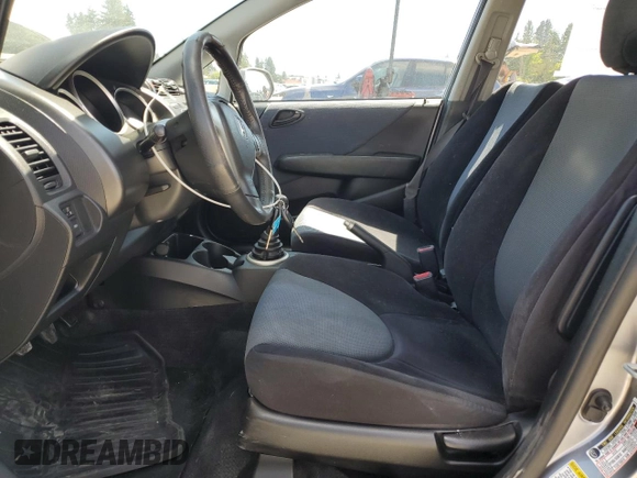 2007 Honda Fit Sport with VIN JHMGD37617S043208, listed as a Copart auction lot 64594825 with 210,672 mi miles and Clean title. Bid and sale history available at DreamBid. Image 7.