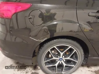 2015 Ford Focus SE with VIN 1FADP3F24FL255450, listed as a IAAI auction lot 41673301 with 103,650 mi miles. Bid and sale history available at carsss.com. Image 19.