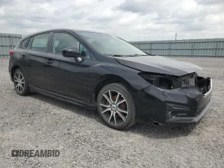 2018 Subaru Impreza with VIN 4S3GTAF65J1751579, listed as a Copart auction lot 61690535 with 77,316 mi miles and Salvage title. Bid and sale history available at DreamBid. Image 4.