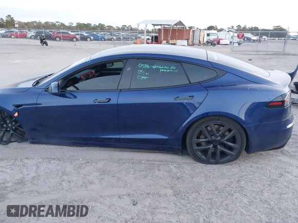 2023 Tesla Model S with VIN 5YJSA1E53PF518986, listed as a IAAI auction lot 41223046 with 22,204 mi miles and . Bid and sale history available at DreamBid. Image 15.