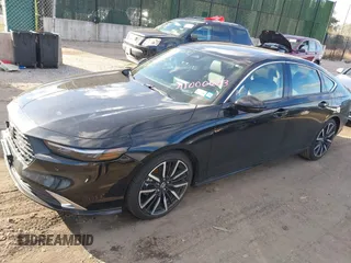2024 Honda Accord Touring z VIN 1HGCY2F89RA044442, wystawiony jako IAAI lot #41000633 z przebiegiem 17 974 mil mil oraz . Historia ofert i sprzedaży dostępna na DreamBid. Obrazek 14.