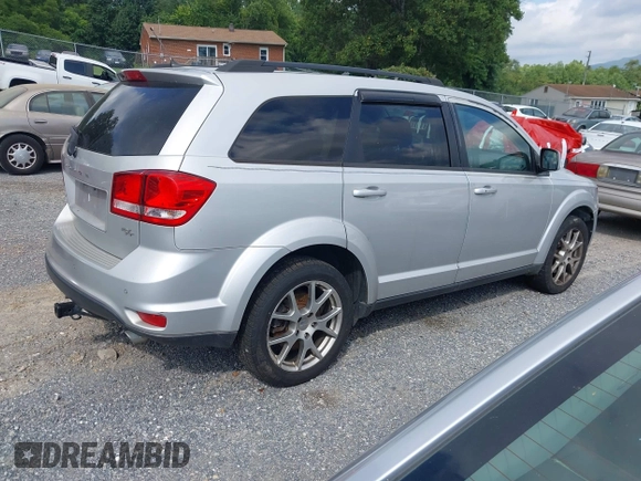2014 Dodge Journey R/T with VIN 3C4PDDEG7ET139410, listed as a IAAI auction lot 42808542 with 185,712 mi miles and . Bid and sale history available at DreamBid. Image 4.