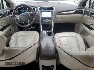 2017 Ford Fusion Titanium z VIN 3FA6P0SU5HR105415, wystawiony jako Copart lot #59779715 z przebiegiem 88 988 mil mil oraz Szkoda całkowita • Salvage title. Historia ofert i sprzedaży dostępna na DreamBid. Obrazek 8.