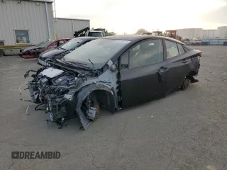 2022 Toyota Prius L Eco with VIN JTDKAMFU2N3178943, listed as a Copart auction lot 84765774 with 14,293 mi miles and Salvage Title. Bid and sale history available at carsss.com. Image 1.