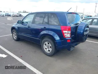 2010 Suzuki Grand Vitara Premium z VIN JS3TE0D27A4100764, wystawiony jako IAAI lot #41949104 z przebiegiem 144 684 mil mil oraz . Historia ofert i sprzedaży dostępna na DreamBid. Obrazek 3.