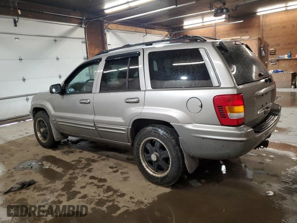 2001 Jeep Grand Cherokee Limited with VIN 1J4GW58N91C664611, listed as a Copart auction lot 53330755 with 212,479 mi miles and Salvage Title. Bid and sale history available at carsss.com. Image 2.