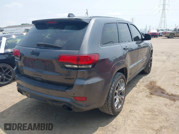 2018 Jeep Grand Cherokee SRT z VIN 1C4RJFDJ7JC281644, wystawiony jako IAAI lot #42481239 z przebiegiem 160 218 mil mil oraz . Historia ofert i sprzedaży dostępna na DreamBid. Obrazek 4.