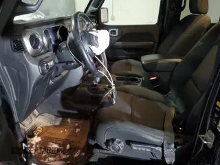 2020 Jeep Wrangler Unlimited Sahara with VIN 1C4HJXEN9LW214550, listed as a Copart auction lot 87586125 with 88,976 mi miles and Salvage Title. Bid and sale history available at carsss.com. Image 7.