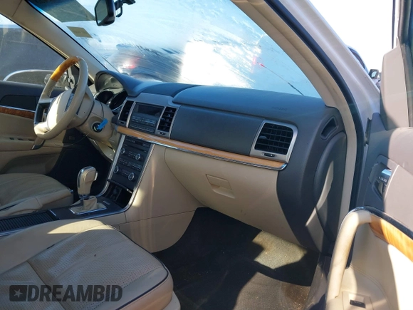 2011 Lincoln MKZ with VIN 3LNHL2GC2BR763917, listed as a IAAI auction lot 41892423 with 119,098 mi miles. Bid and sale history available at carsss.com. Image 5.