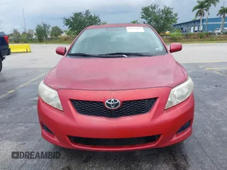 2009 Toyota Corolla with VIN 1NXBU40E39Z022074, listed as a IAAI auction lot 41987902 with 121,206 mi miles. Bid and sale history available at carsss.com. Image 6.