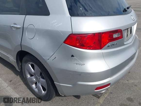 2007 Acura RDX Technology z VIN 5J8TB18527A010225, wystawiony jako IAAI lot #42120643 z przebiegiem 166 278 mil mil oraz . Historia ofert i sprzedaży dostępna na DreamBid. Obrazek 6.