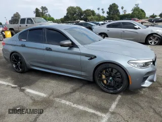 2018 BMW M5 z VIN WBSJF0C50JB282083, wystawiony jako Copart lot #55845673 z przebiegiem 39 691 mil mil oraz . Historia ofert i sprzedaży dostępna na DreamBid. Obrazek 4.