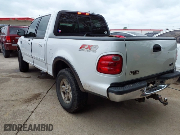 2002 Ford F-150 XLT with VIN 1FTRW08L02KE29411, listed as a IAAI auction lot 42133550 with 270,752 mi miles. Bid and sale history available at carsss.com. Image 3.