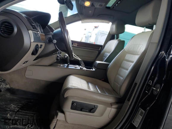2010 Volkswagen Touareg VR6 with VIN WVGBF7A98AD001321, listed as a Copart auction lot 48949685 with 101,944 mi miles and Salvage Title. Bid and sale history available at DreamBid. Image 7.