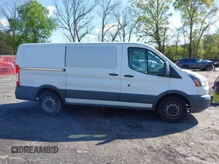 2015 Ford Transit Cargo with VIN 1FTNE1YM0FKA48857, listed as a IAAI auction lot 42018604 with 267,320 mi miles and . Bid and sale history available at DreamBid. Image 13.