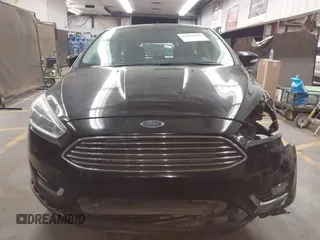2017 Ford Focus Titanium with VIN 1FADP3N24HL272396, listed as a IAAI auction lot 41852208 with 92,945 mi miles and . Bid and sale history available at carsss.com. Image 13.