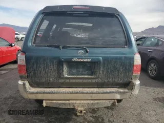 1997 Toyota 4Runner SR5 z VIN JT3HN86R9V0059388, wystawiony jako Copart lot #59231815 z przebiegiem 310 270 mil mil oraz Szkoda całkowita • Salvage title. Historia ofert i sprzedaży dostępna na DreamBid. Obrazek 6.