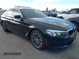 2019 BMW 5 Series 530i with VIN WBAJA5C54KWW45379, listed as a IAAI auction lot 41276092 with 77,025 mi miles. Bid and sale history available at carsss.com. Image 1.