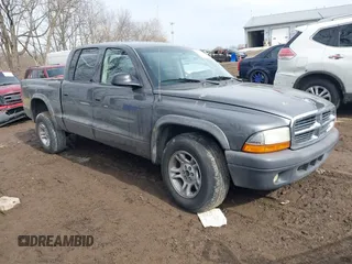 2004 Dodge Dakota Sport z VIN 1D7HL38K64S651151, wystawiony jako IAAI lot #41640874 z przebiegiem 194 771 mil mil oraz . Historia ofert i sprzedaży dostępna na DreamBid. Obrazek 1.