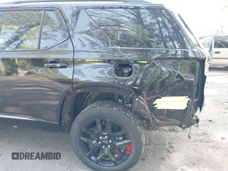 2023 Chevrolet Traverse Premier with VIN 1GNERKKW8PJ334863, listed as a IAAI auction lot 42060557 with 24,108 mi miles and . Bid and sale history available at DreamBid. Image 18.