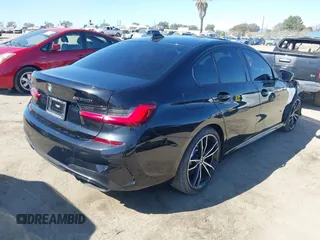 2021 BMW 3 Series M340i xDrive with VIN 3MW5U9J0XM8B49022, listed as a IAAI auction lot 41637152 with 65,452 mi miles. Bid and sale history available at carsss.com. Image 4.