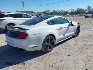 2022 Ford Mustang EcoBoost with VIN 1FA6P8TH5N5139871, listed as a IAAI auction lot 41290333 with 28,566 mi miles and . Bid and sale history available at DreamBid. Image 4.