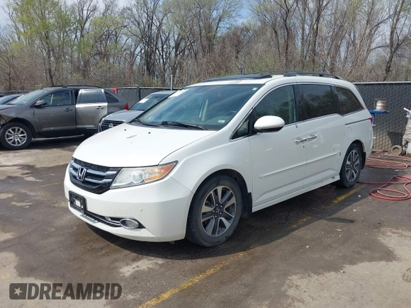 2014 Honda Odyssey Touring с VIN 5FNRL5H94EB057681, выставлен на аукционе IAAI как лот 41828000 с пробегом 249 350 миль миль и . История ставок и продаж доступна на DreamBid. Изображение 2.