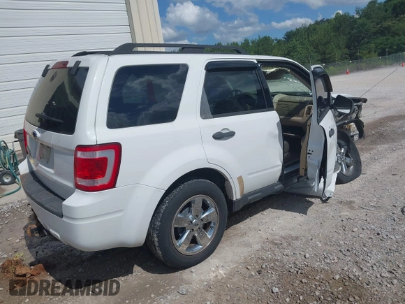 2008 Ford Escape XLT with VIN 1FMCU03168KD51111, listed as a IAAI auction lot 42523942 with 123,203 mi miles and . Bid and sale history available at DreamBid. Image 4.