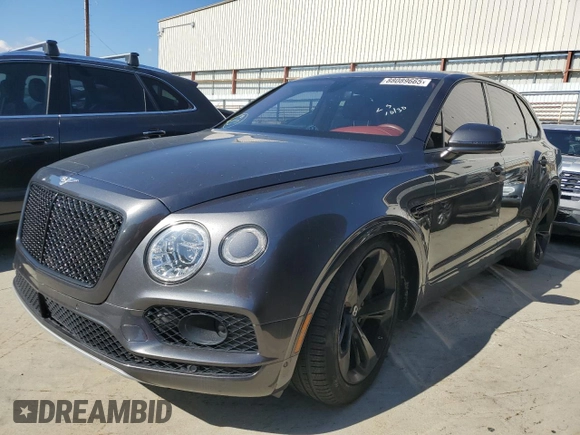 2018 Bentley Bentayga Signature z VIN SJAAC2ZV7JC019555, wystawiony jako Copart lot #88089665 z przebiegiem 50 323 mil mil oraz Szkody całkowita. Historia ofert i sprzedaży dostępna na DreamBid. Obrazek 1.