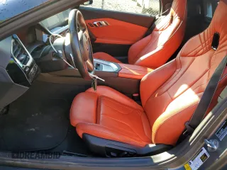 2020 BMW Z4 sDriveM40i z VIN WBAHF9C00LWW76934, wystawiony jako Copart lot #55810755 z przebiegiem 52 230 mil mil oraz Szkody całkowita. Historia ofert i sprzedaży dostępna na DreamBid. Obrazek 7.