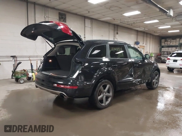 2015 Audi Q7 Premium Plus with VIN WA1LGAFE2FD005746, listed as a IAAI auction lot 42143924 with 143,835 mi miles and . Bid and sale history available at DreamBid. Image 4.